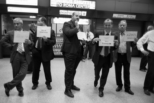 Men waiting at Airport
